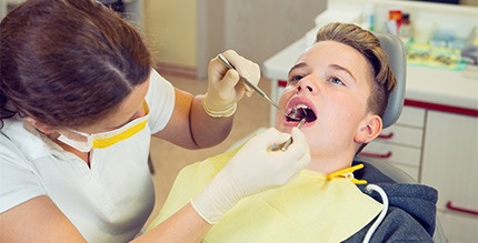 A teen at the dental office