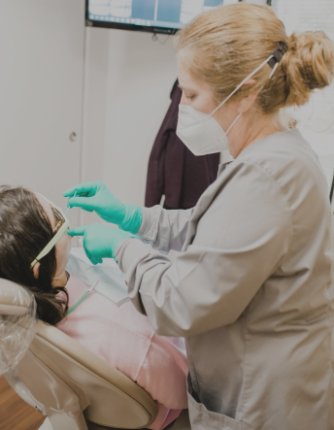 Millersville dental team member treating a patient